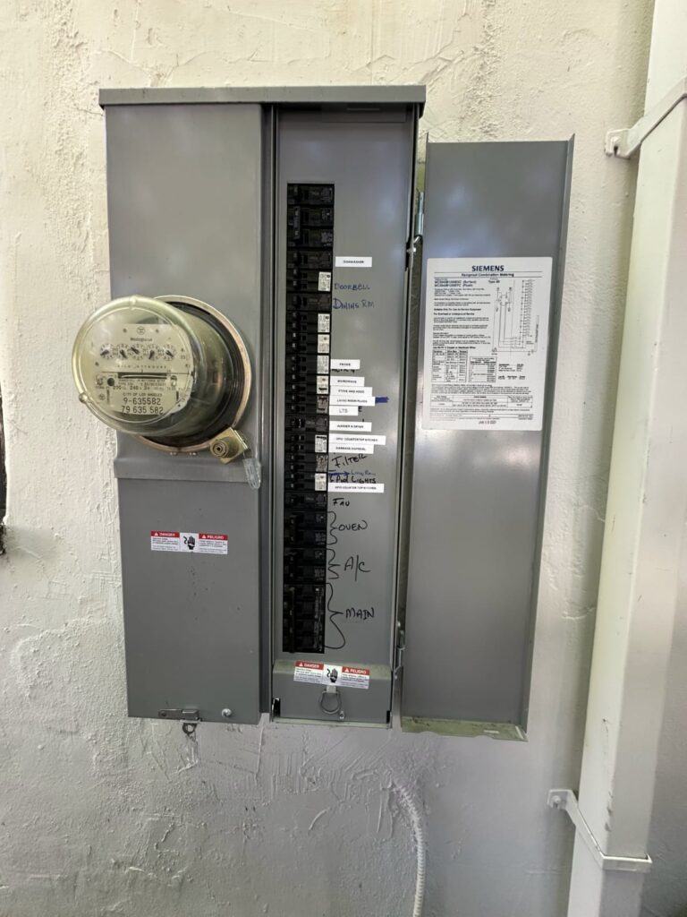 Residential electric meter used to track home cooling energy costs in Los Angeles