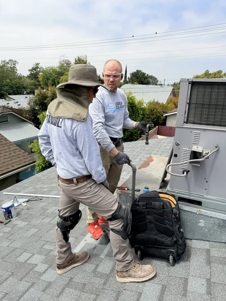 Cold Cloud technicians servicing a rooftop package unit in Los Angeles