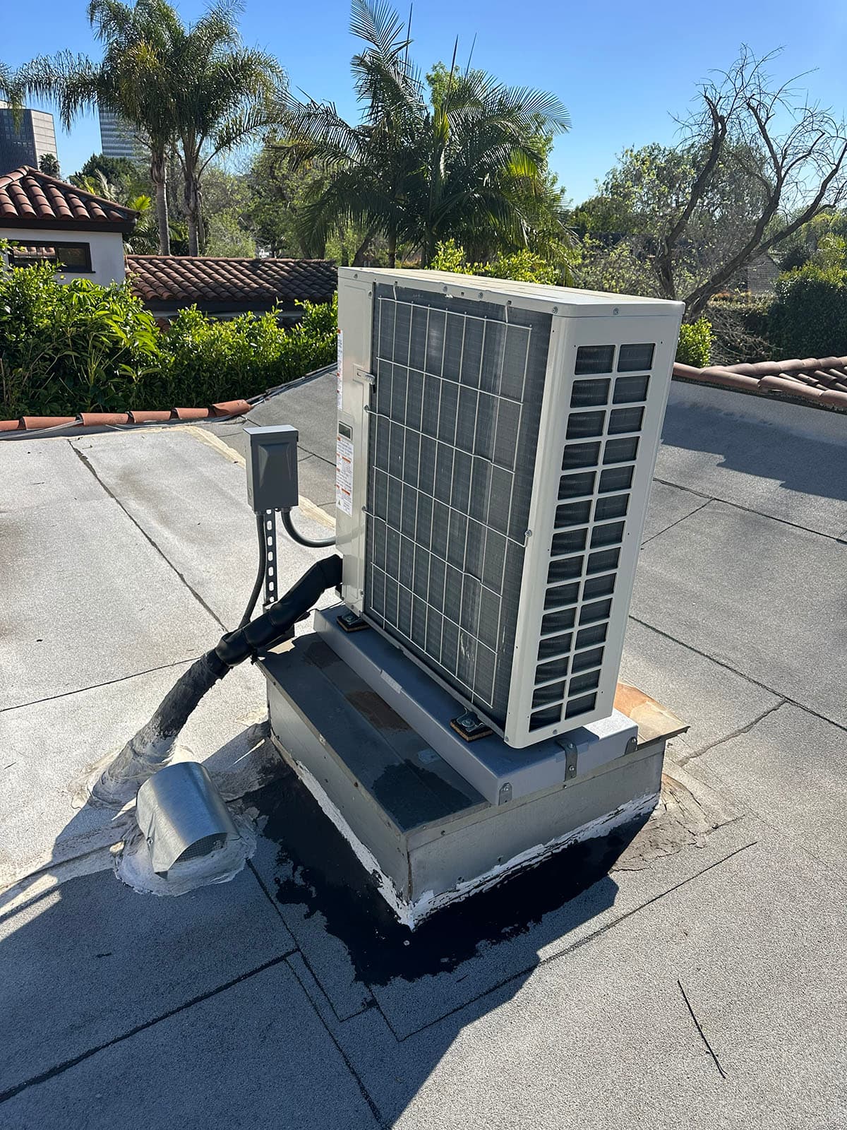 Completed rooftop HVAC installation with Daikin heat pump system