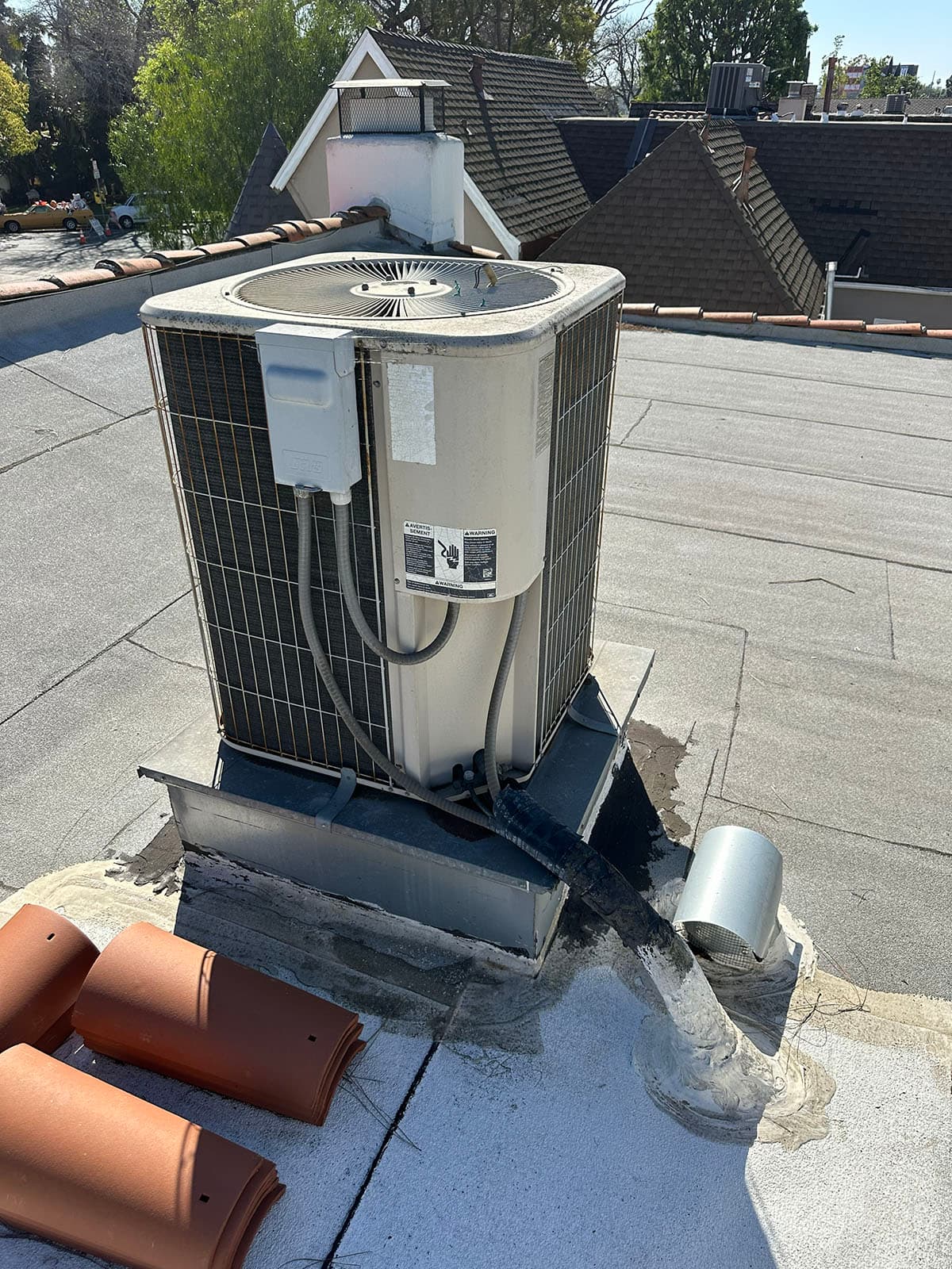 Existing rooftop HVAC unit before replacement in Sierra Madre
