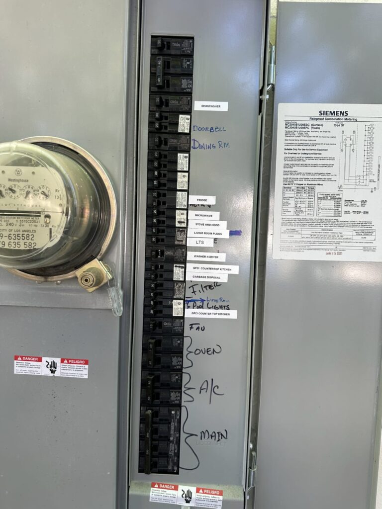 Checking a tripped indoor breaker when the AC is running but not blowing air Residential electrical panel showing breakers for an air handler and AC condenser