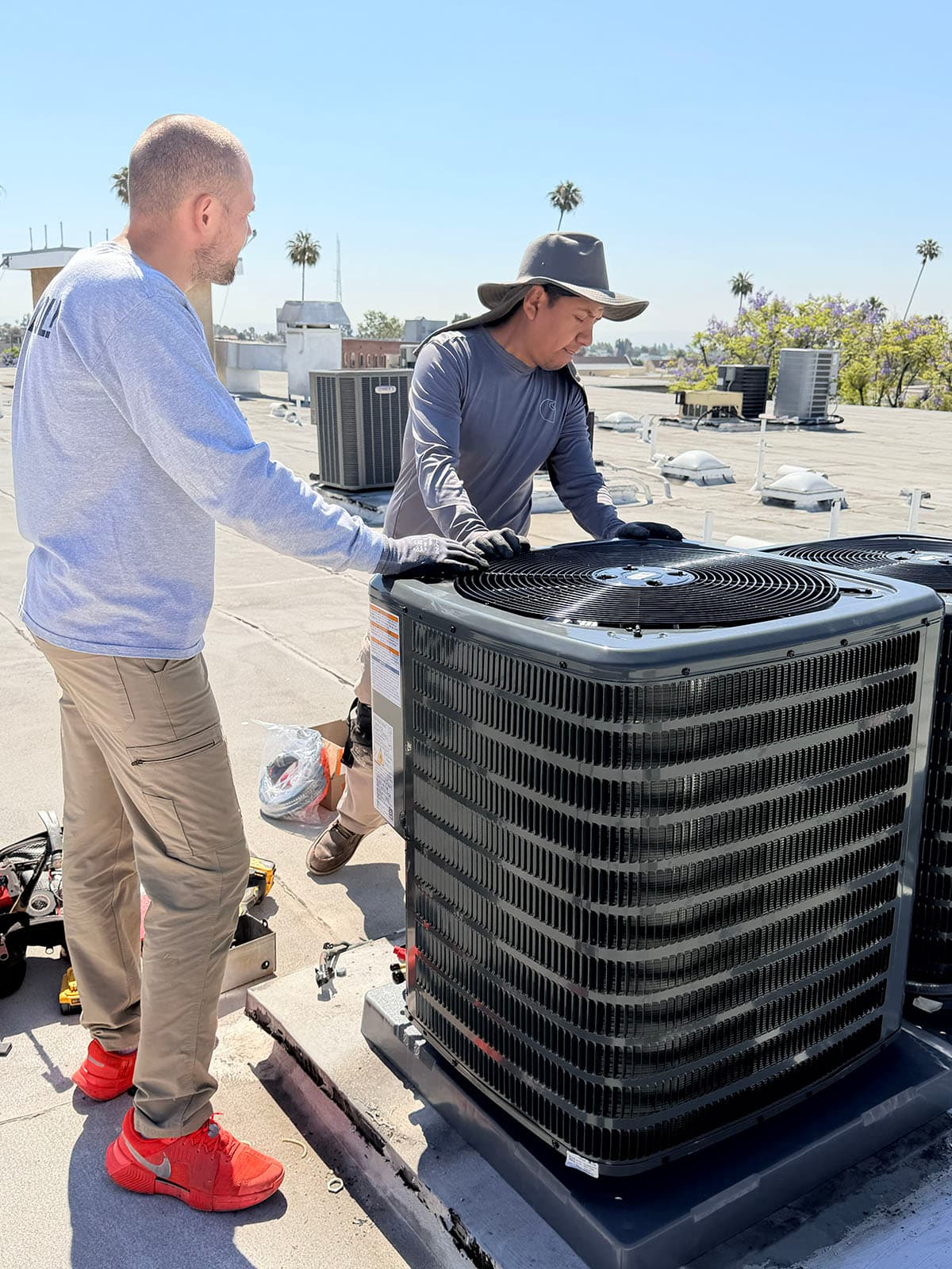 New Goodman 2-ton rooftop heat pump installed at a Pasadena condo