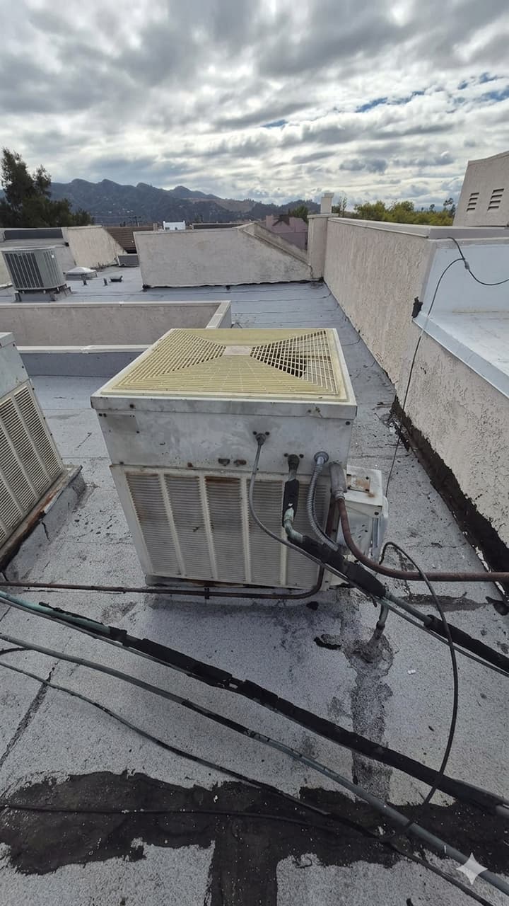 Old 1981 split system before Daikin heat pump upgrade in Glendale