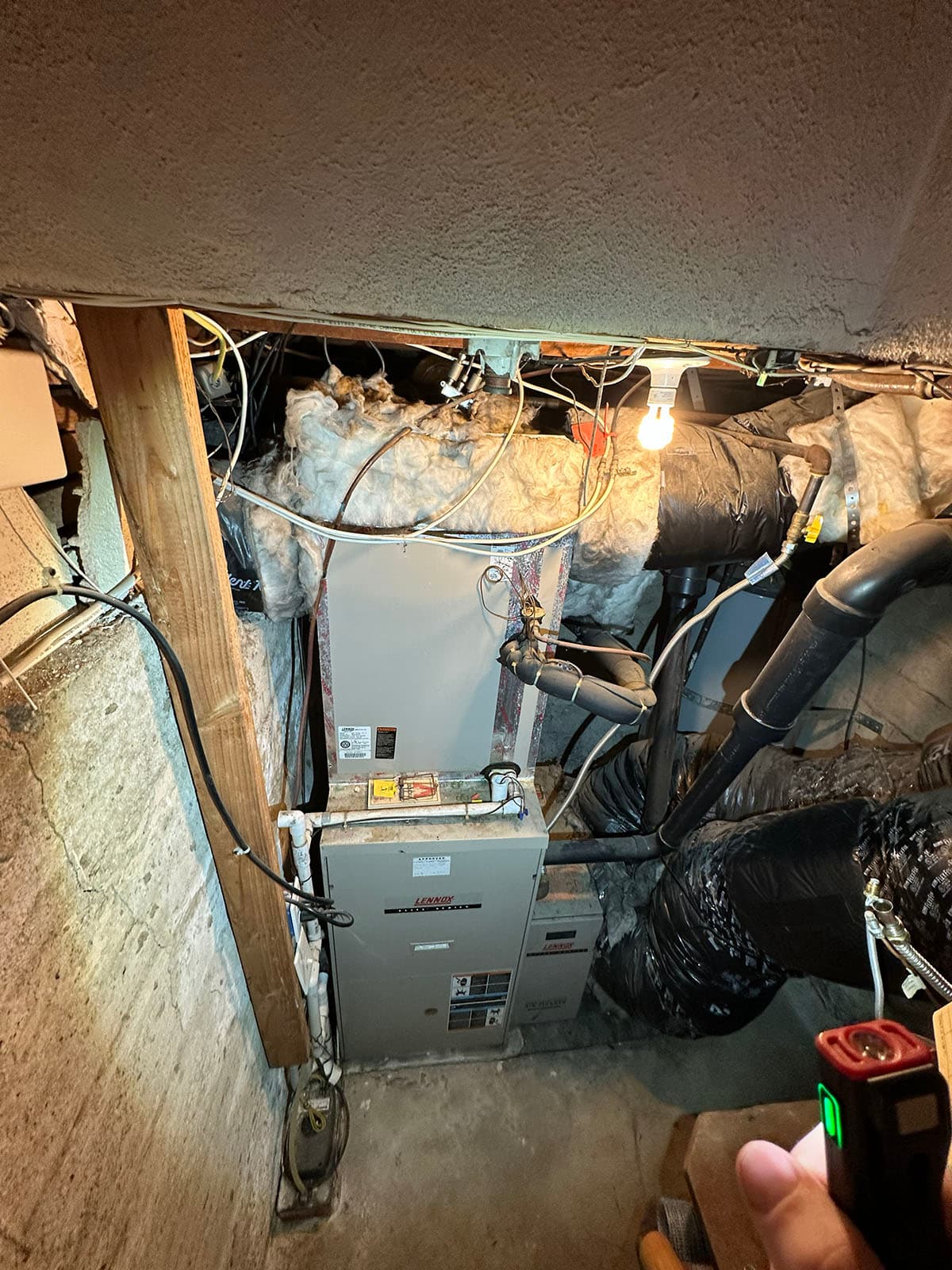 Old attic HVAC equipment before replacement in Sierra Madre home