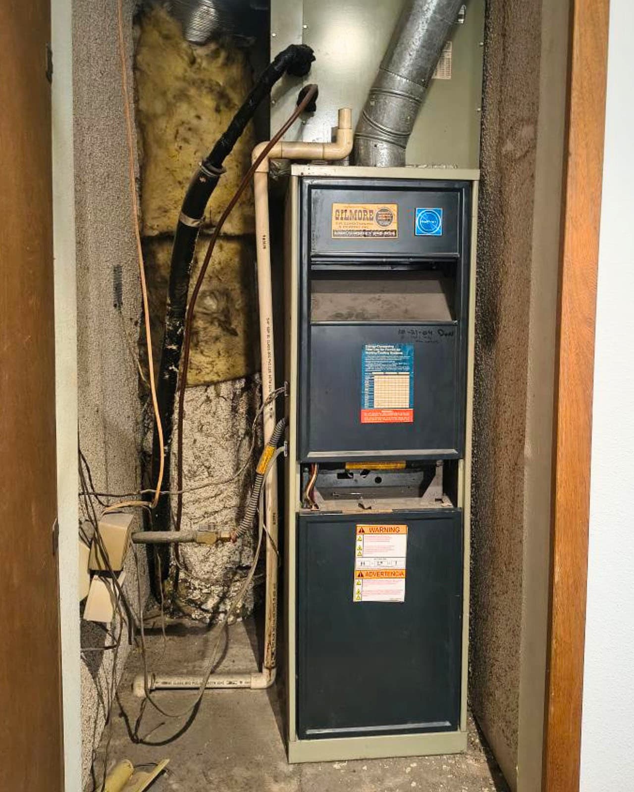 Old gas furnace in closet before attic relocation Old gas furnace in closet before attic relocation