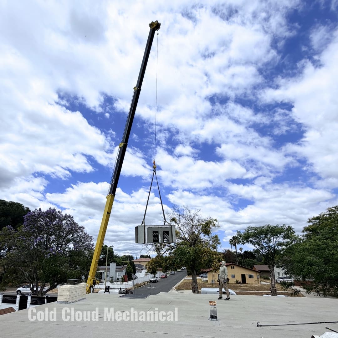 Crane lift Goodman 3.5 ton package unit in Granada Hills