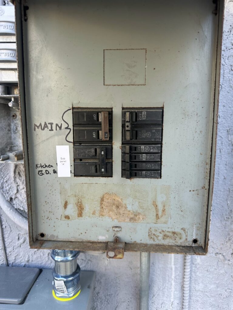 Residential electric panel that may need an upgrade before a new central AC installation