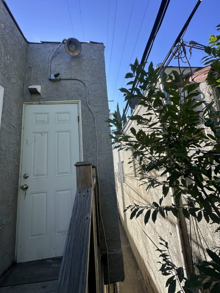 Residential rooftop in the Los Angeles area, where permit jurisdiction affects central air installation cost