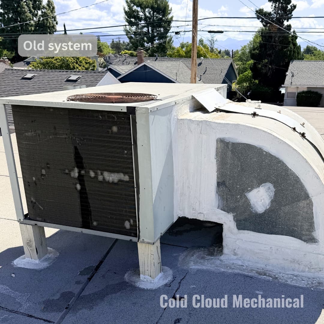 Old package unit on roof before Goodman R32 installation