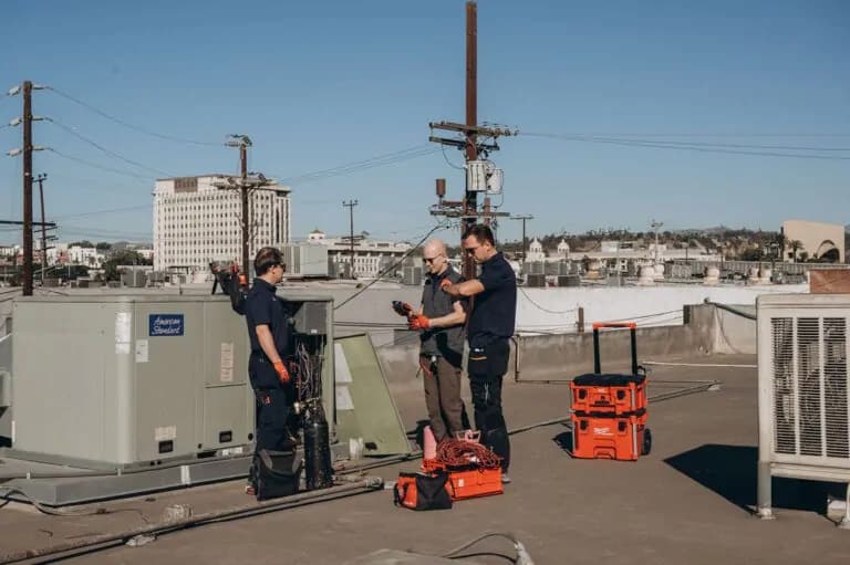HVAC technicians performing rooftop unit maintenance in Los Angeles