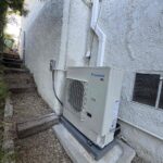3.5-ton outdoor AC condenser unit on concrete pad at residential property