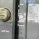 Residential electrical panel assessed during HVAC repair diagnostic