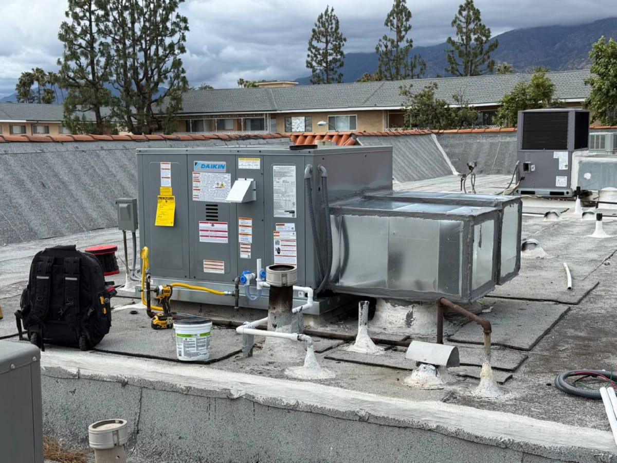 Gas pack HVAC package unit installed on flat commercial roof