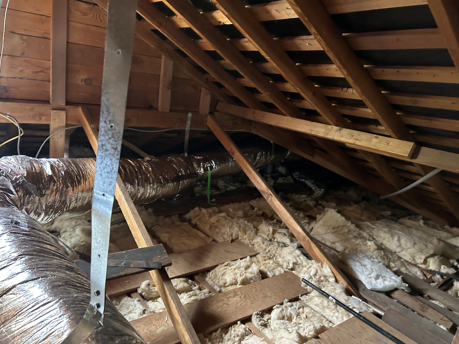 Straight, tight duct runs hung from the rafters on metal straps, clear of the attic floor, in Altadena 91001