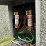 Close-up of electrical wiring connections inside HVAC junction box