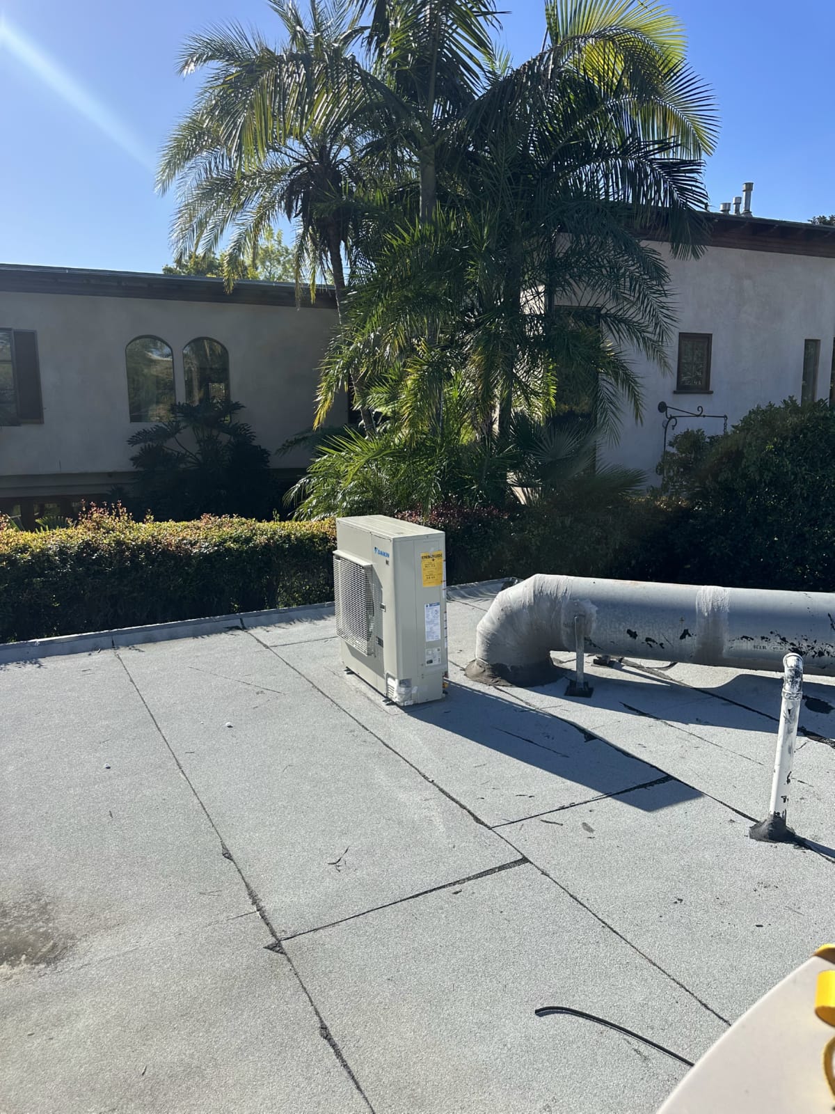 HVAC system serving a home in the LA basin's seasonal air quality conditions Outdoor HVAC equipment on residential property in Los Angeles