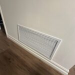Interior supply air vent register in residential home