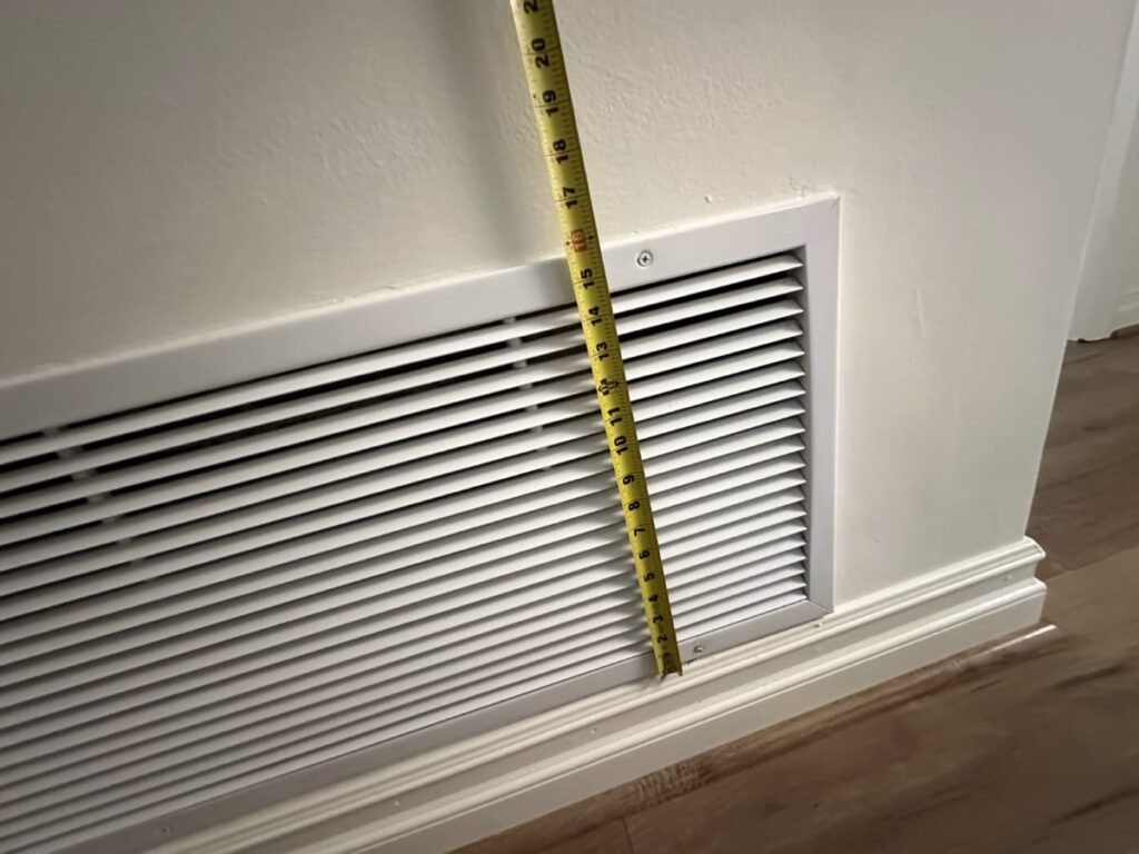 Interior supply air vent register in residential home