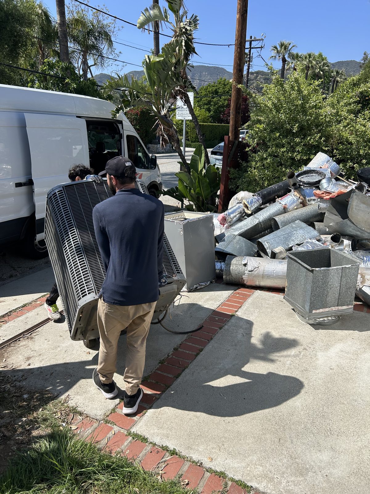 Smoke-contaminated ductwork and old equipment removed from the house and hauled away in Altadena 91001